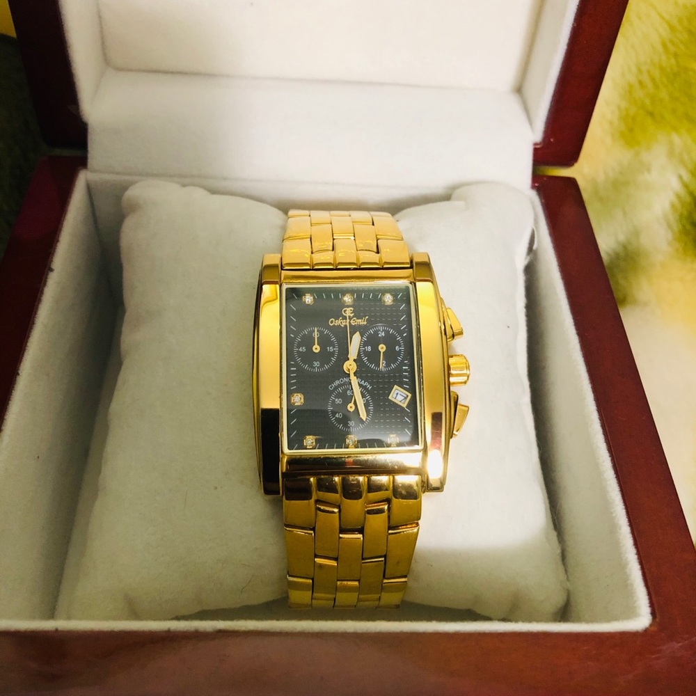 Oskar Emil gold plated and 7 diamond watch